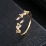 Elegant Gold-colored Ring with a Leaf Design - Image 3