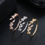 Elegant Silver-colored Ring with a Leaf Design - Image 2